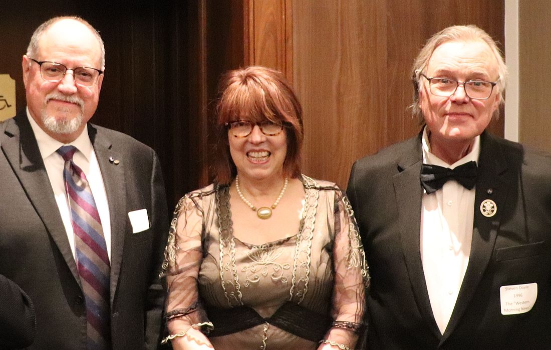 Pamela Wampler is honored as The Woman 2024, with Mark Gagen and Steve Doyle